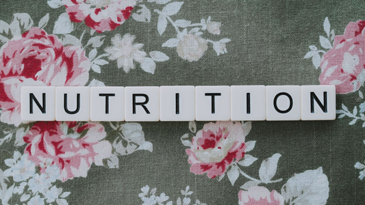 White tiles spelling out 'nutrition'